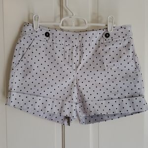 White with black polka-dot shorts